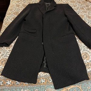 Fully lined overcoat.